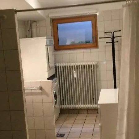 Ferienwohnung Am Hang, Souterrain Apartman *